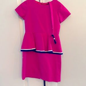 Pink peplum dress with bow belt